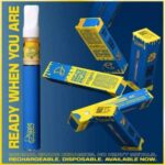 A blue and yellow Drippz - Disposable 0.5G box with a blue and yellow vaporizer.